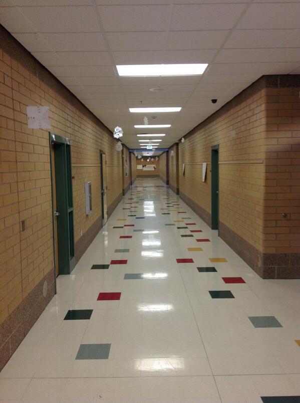 samrencher's tweet photo. Look at our festive school.  Mrs. Harding, our art teacher did these snowflakes.  Hung them all. http://t.co/OnCk6ZdLer
