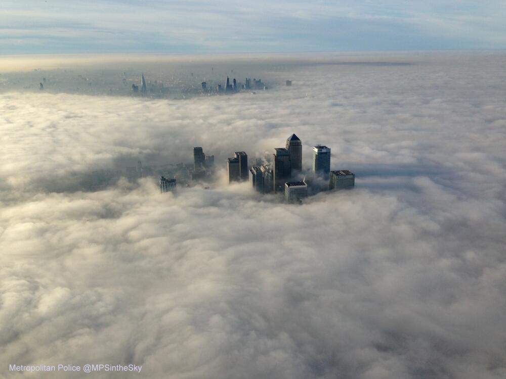Canary Wharf Surrounded By Fog from @MPSinthesky Embedded image permalink