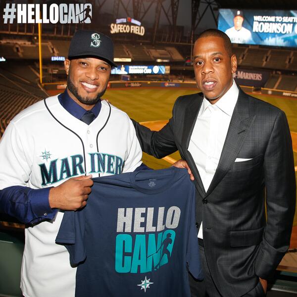 Mariners's tweet photo. Robbie and Jay-Z have another #HelloCano T-shirt for one lucky fan. RT and follow for a chance to win. http://t.co/TCUKx9HFcU