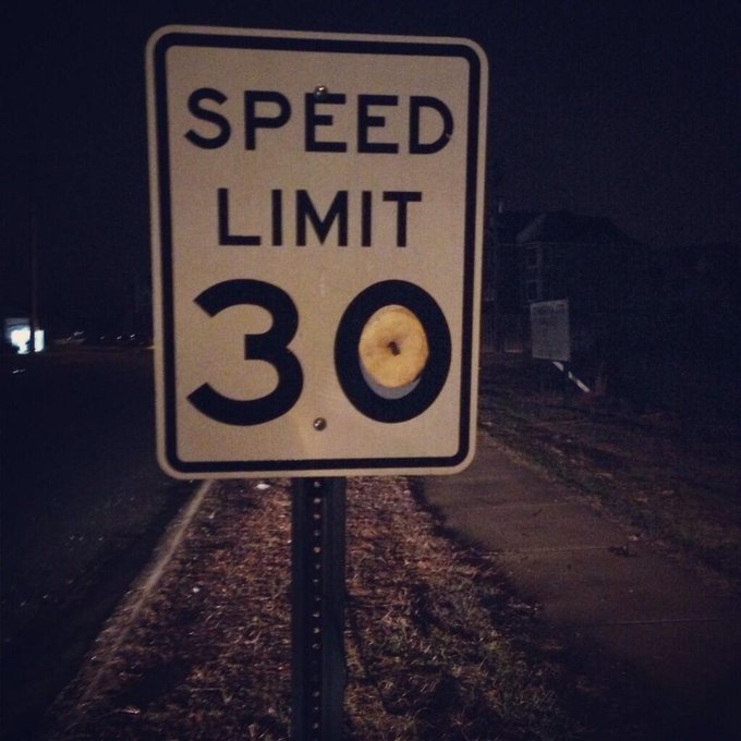 Apparently, at UCA during finals week it's ok to paste random donuts to road signs. @UCAPoliceDept @NotTheEcho