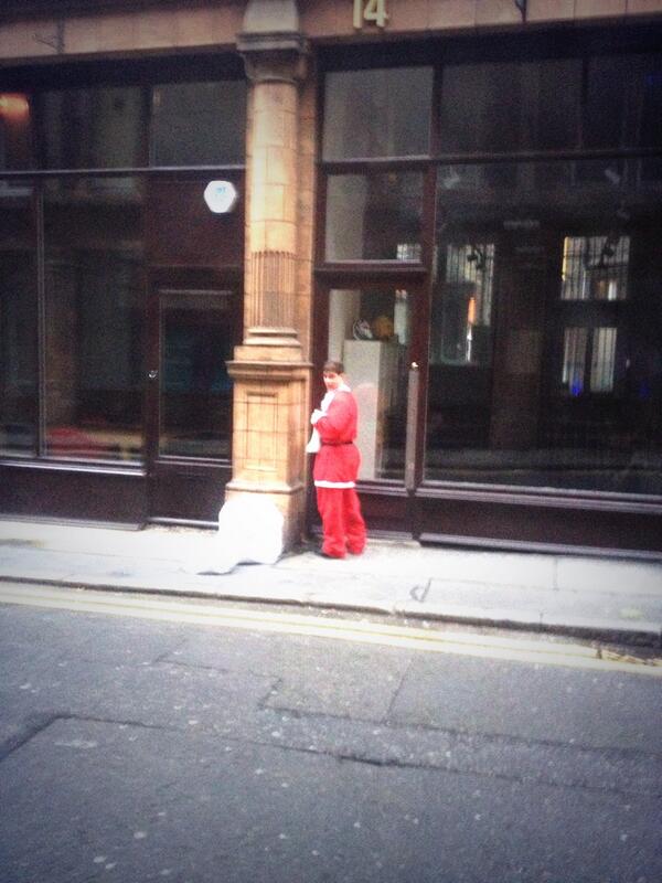 Santa is pissing on the street outside our building. #christmas