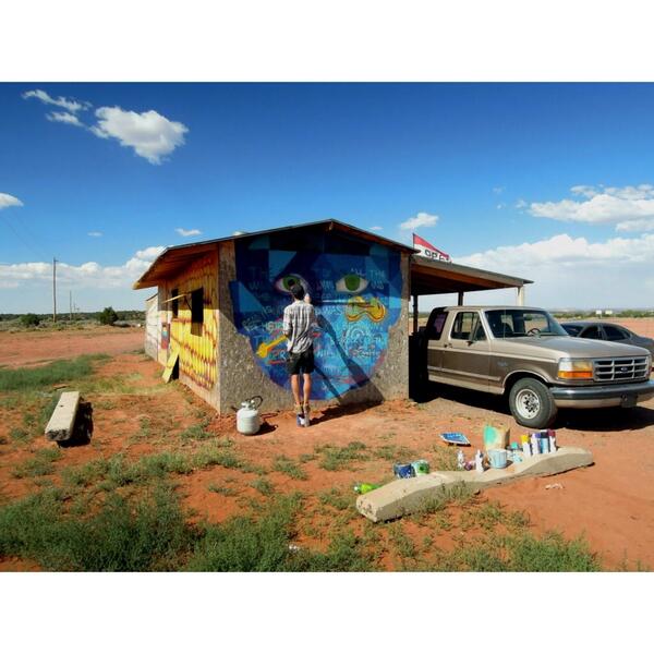 SprawlrMag's tweet image. Artist Overunder painting on the Navajo Reservation in June 2012 as part of the ongoing #painteddesertproject