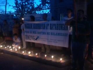tudlaprod's tweet photo. Members of @Tindog_PKK lighted candles to remember the victims of typhoon Yolanda. http://t.co/wfB29lTtMx