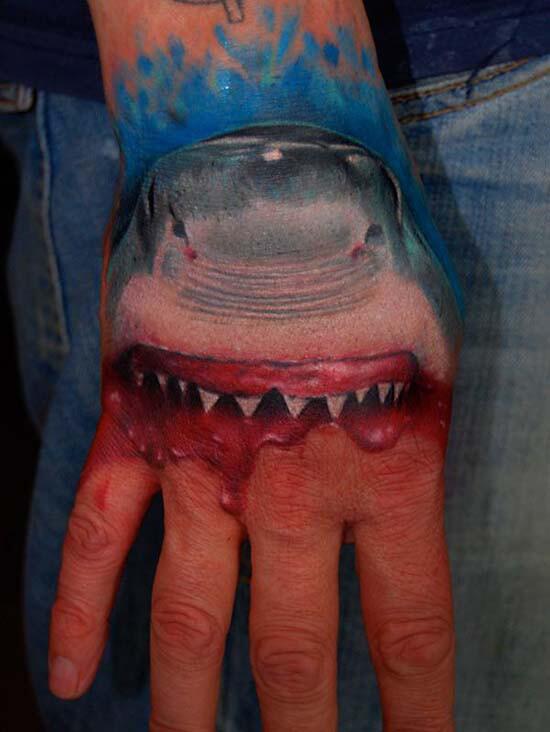 culttattoos's tweet photo. JAWS hand tattoo - http://t.co/Oc5NPpCEDJ