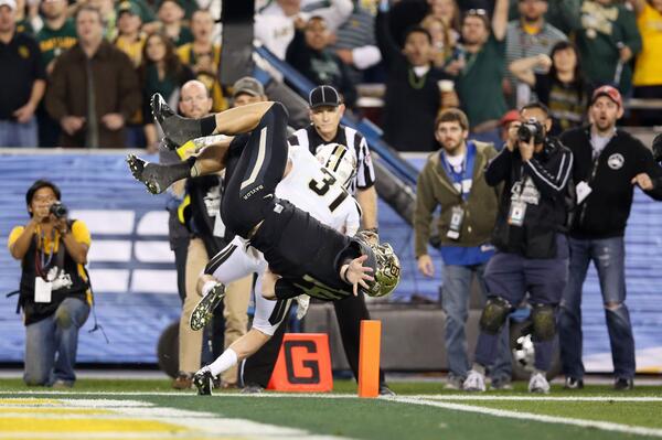 SportsCenter's tweet image. Picture of the day? Bryce Petty flips in for a TD in the first half of #FiestaBowl.
