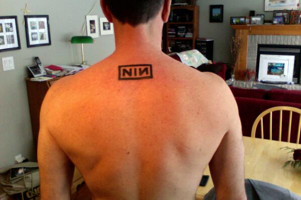 Tanman_Canada's tweet photo. Inked for the first time last night.  #NIN #NINBranded @nineinchnails @NINarmy http://t.co/600Zo9rCtd