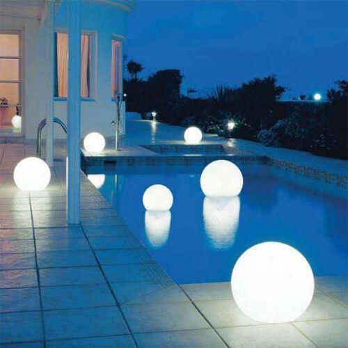 Add floating LED balls to your #swimming #pool to create a classic, modern look! #makeover