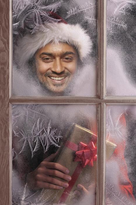 Surya come to your home with gift to say christmas wishes