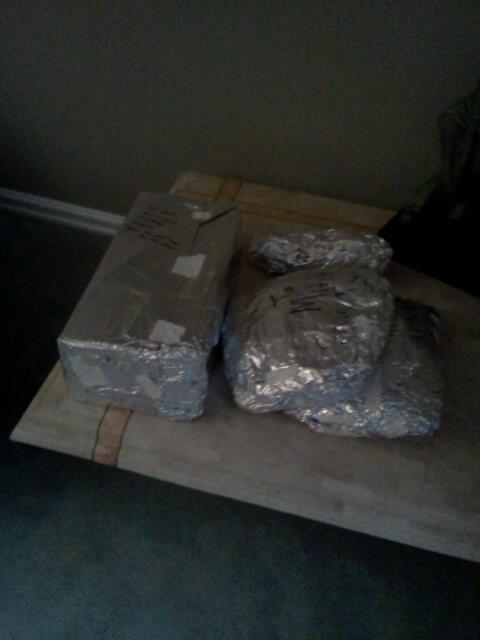 GooglesTheChimp's tweet photo. This is what happens when you don't have wrapping paper #TinFoil http://t.co/RdDTUpbY0Q
