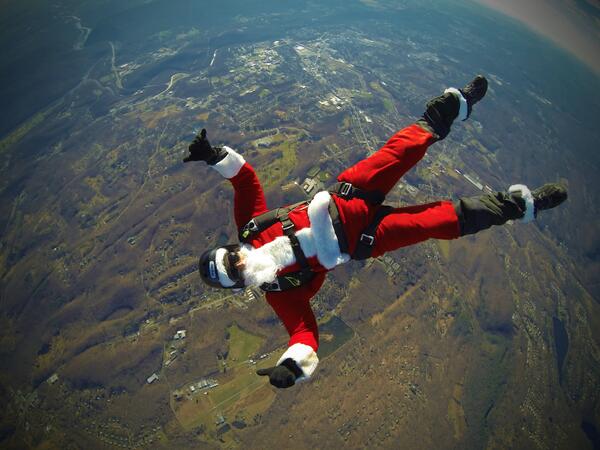 GoPro's tweet photo. Photo of the Day! After the gifts are delivered... Santa goes skydiving! Photo by elf August Haeuser. #GoPro http://t.co/P6pYkayOnJ