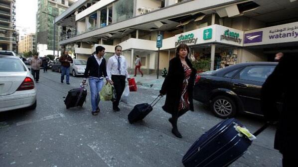 LBCI_News_EN's tweet photo. Photo depicting tourists leaving a hotel near the explosion's site #StarcoExplosion #Lebanon http://t.co/ZwZ1hmiyLE