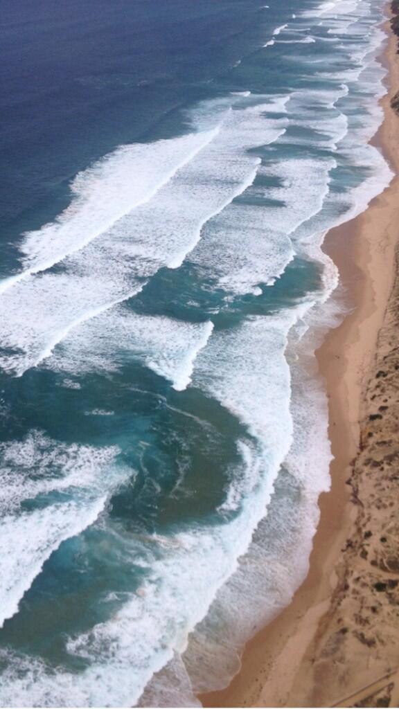 Rip Currents at Phillip Island today. Darker water + no waves breaking- that's the rip currents which can be deadly