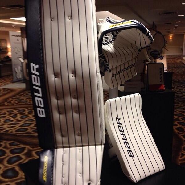 SportsCenter's tweet photo. Check out Rangers goalie Henrik Lundqvist's pinstriped pads for their outdoor game at Yankee Stadium (via @uniwatch) http://t.co/FE78m5ufVE