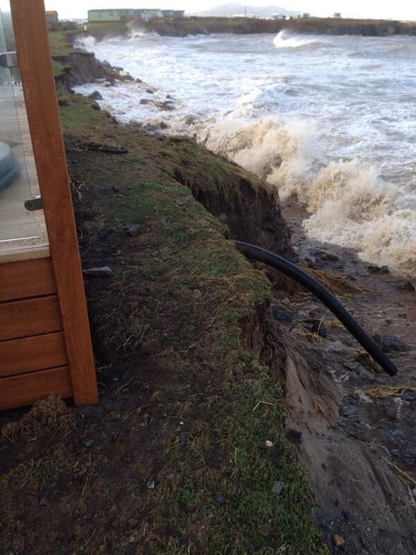 jagret's tweet photo. @bbcweather #sandybeachwales  Devastation just about swallowed up. Static caravans teetering on the brink. http://t.co/5d3XtCDtdy