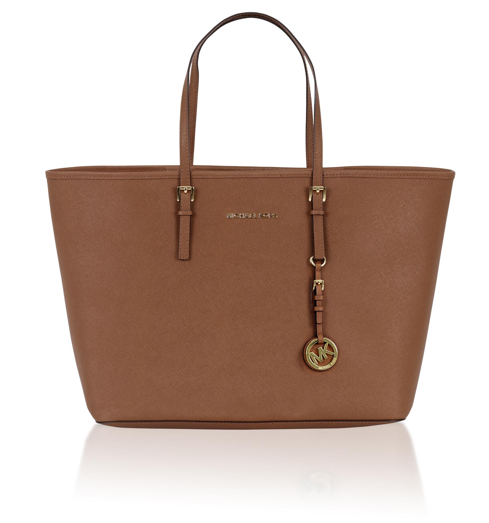 Brown Thomas on "#IconicBag pick for this season is the Classic Tan Michael Kors Jet Set http://t.co/G413i99ynh" Twitter
