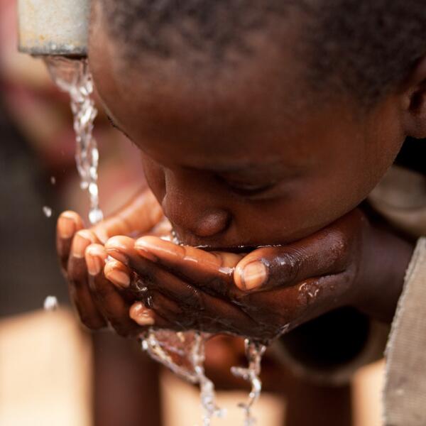 charitywater's tweet photo. For kids in Kaziba, Rwanda, clean water like this means better health and better futures. #waterchangeseverything http://t.co/C3afw5at2d
