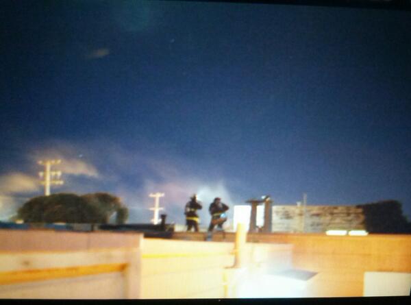 cbogart's tweet photo. Firefighters on roof extinguishing fire from explosion 46th &amp; judah http://t.co/NQcILwnCSc