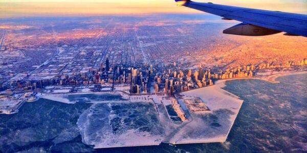 HuffPost's tweet image. What Chicago looks like under ice, thanks to the #PolarVortex huff.to/19QLhQi