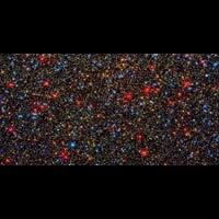 SETIInstitute's tweet photo. Hubble Space Telescope snapped this panoramic view of a colorful assortment of 100,000 stars. http://t.co/blf7U8Lj2U http://t.co/kMUeEMGhNs
