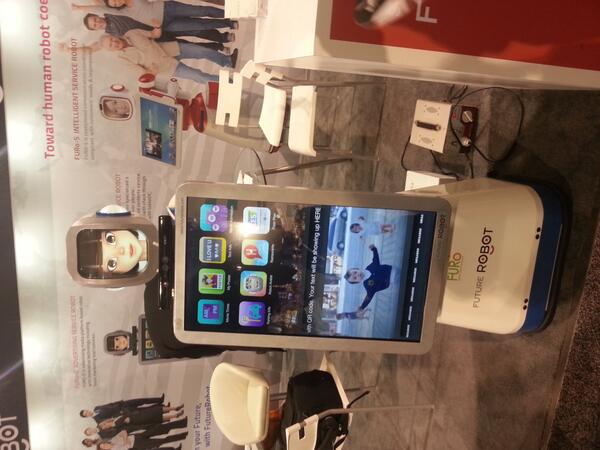 Luke_Hickton's tweet photo. #CES2014 Q:What do you get if you cross a Japanese lady and an Ipad? A: A  #FURO #robot! http://t.co/QdWsSBsEkh