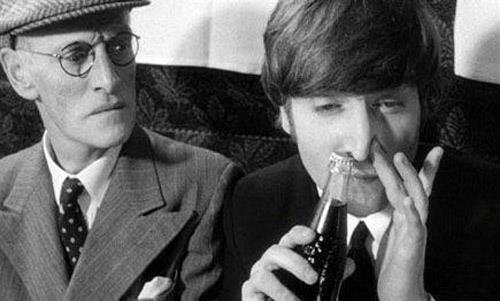 John Lennon sniffing Coke