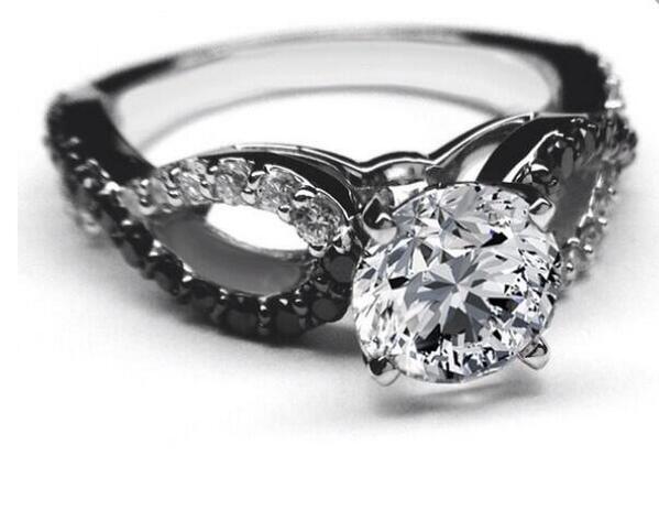 <a href="/AmyFlemingHL/">Amy Fleming</a> - -slowly opens the box to reveal the ring inside-