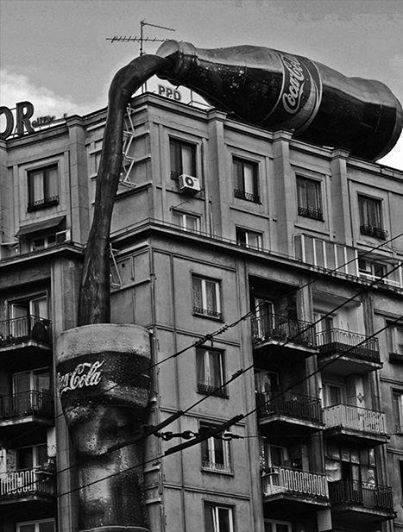 SchitzoAcademy's tweet photo. Vintage Coca-Cola Advertising in Bucharest, Romania. http://t.co/t9bd3UUASl