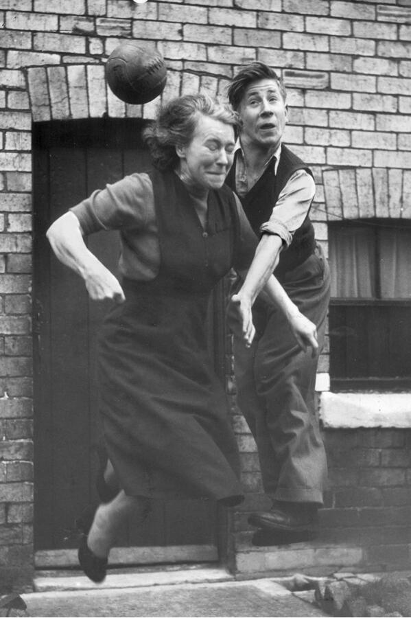 OldFootyPics's tweet photo. Bobby Charlton practices his heading skills with his mother Elizabeth in the street outside their home, 1953. http://t.co/i4duxRuXIf