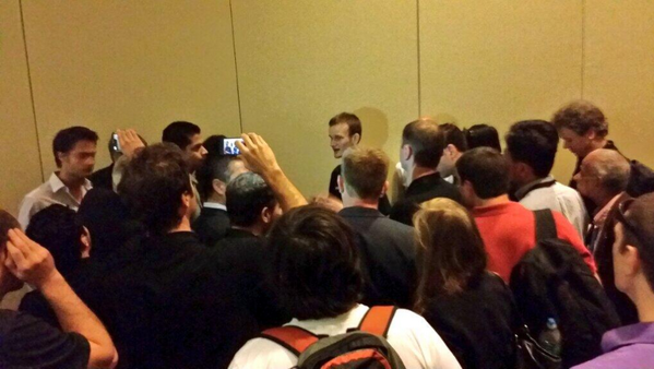 CryptoInPics's tweet photo. Large crowd surrounds Vitalik Buterin after his talk about #Ethereum at the Bitcoin conference in Miami. http://t.co/tmBvBQ2IjA