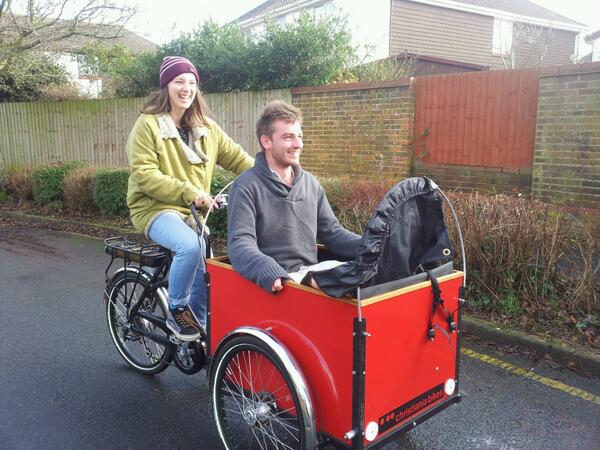 Girl power at kidsandfamilycycles.co.uk.Exeter Uni students experience their first cargo bike,electric christiania bike.