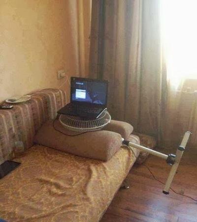 CryptoInPics's tweet photo. Big fan is cooling off a laptop mining dogecoins. #dogecoin http://t.co/t6QoDxEe2h
