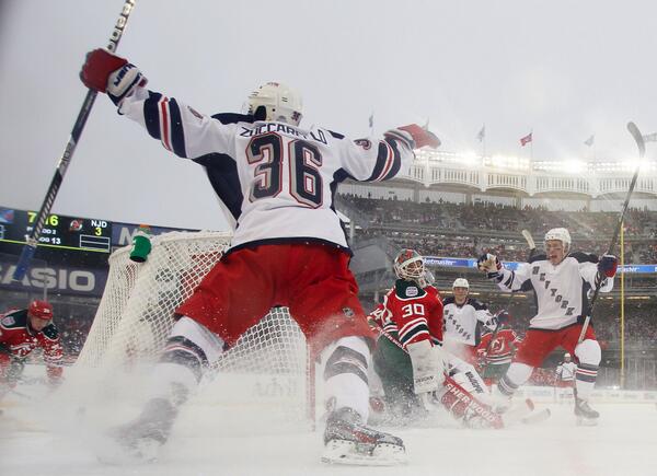 SportsCenter's tweet photo. In snow and frigid temperatures at Yankee Stadium, Rangers score 6 straight goals to beat Devils, 7-3. http://t.co/CPZ2yCB8WM