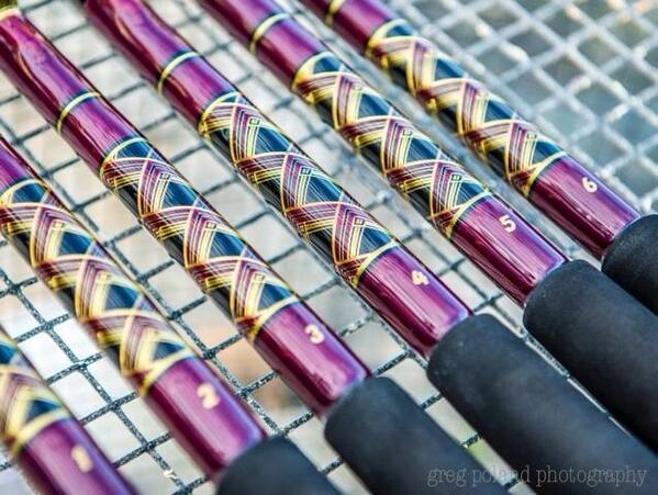 6 custom 50 lb. trolling rods with an open 4 sided chevron wrap