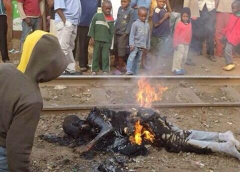 PHOTO: Man burnt alive in Nigeria because he was gay? 2 Embedded image permalink