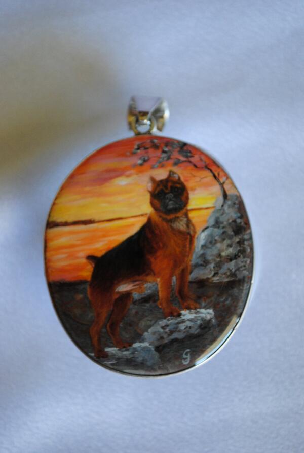 Custom painted pendants for dog lovers.