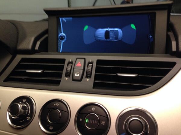 CARlectra's tweet photo. BMW Z4 retrofit parkeersensoren front &amp; rear met optische weergave signalering over originele CIC #BMW #Retrofit http://t.co/8YC9jkMrdl