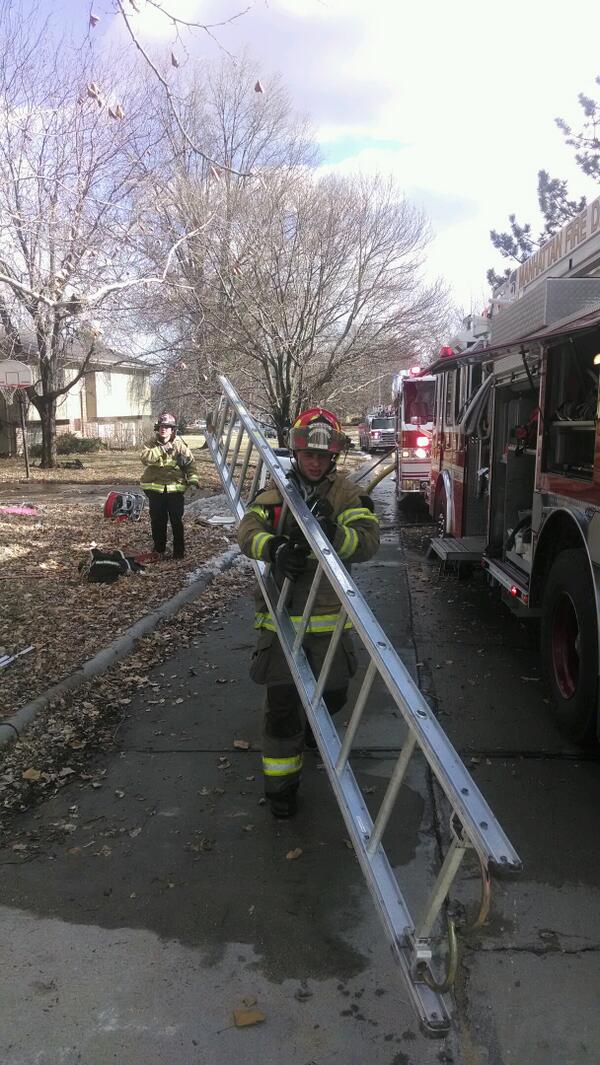 ManhattanFD's tweet photo. One of our @KState student Firefighters hard at work #GaryFire http://t.co/64lZMmw3ql