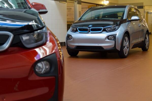 OttosBMWGenius's tweet photo. What's cooler than a @BMWi #i3? Well, two of them of course! Left is Solar Orange with Ionic Silver on the right. http://t.co/uKDznhs6rp