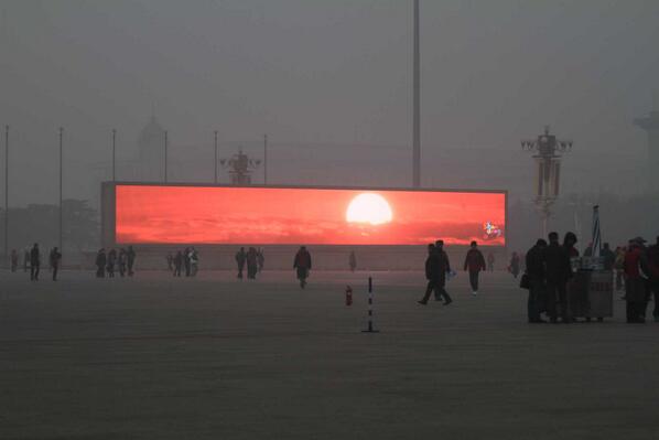 TIME's tweet image. Smog in Beijing is so awful they have to show sunlight on a big screen ti.me/1fEol9a