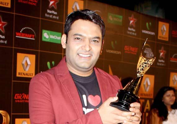 @kapilsharmak9 wid "The Best Comedy Series" award@ #StarGuildAwards

How many RT 4 our comedy King&amp; @comedynightsk9 ?