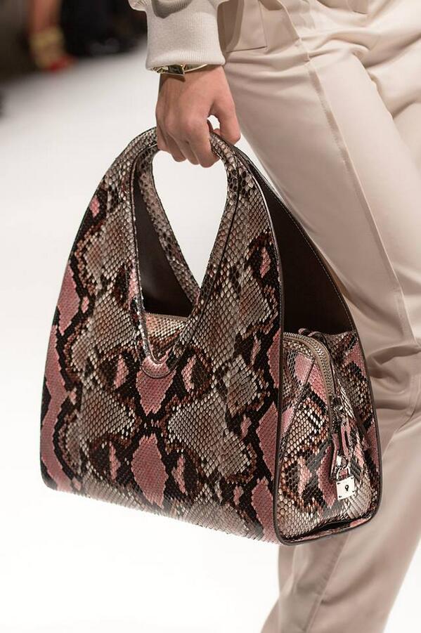 Ferragamo's tweet photo. Hand-painted #PinkPython handbags pioneered the Milan runway for #SS14. #ThinkPink http://t.co/0kNse1RnNQ
