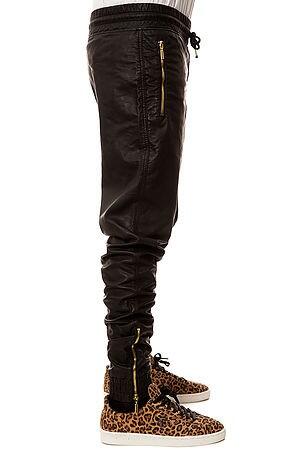 Karmaloop's tweet image. [New Arrival] The #Ages Vegan Leather Pants in Black just hit the site - kloop.ly/1eGWnof #joggers
