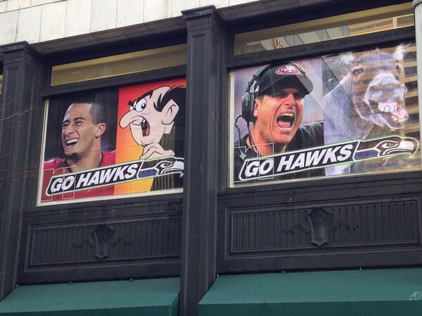 jonhumbert's tweet photo. #Hawkitecture windows at Remer Inc make big fun of the #49ers. Kaep as Gargamel: http://t.co/dm0JIlc8MF