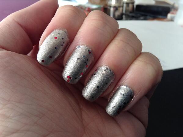 ChelseasNails's tweet photo. Silver micro glitter polish with red/black/silver larger glitter over the top and a matte top coat. Simple and fun! http://t.co/4qiBBXPYJS