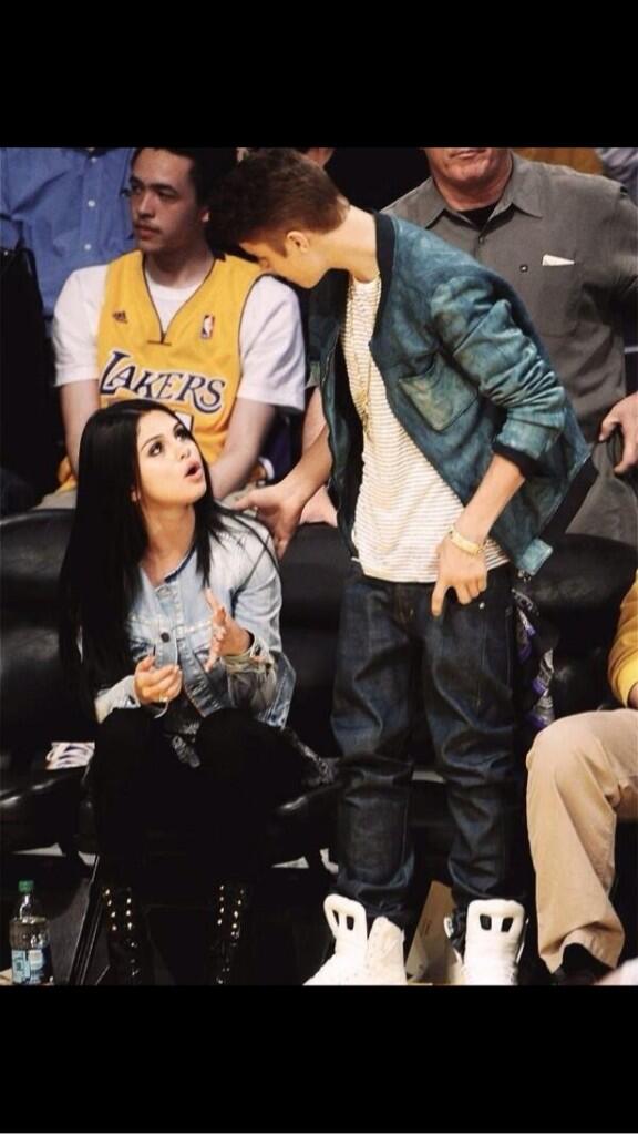 selg86's tweet image. Talking with my fiancé at basketball game