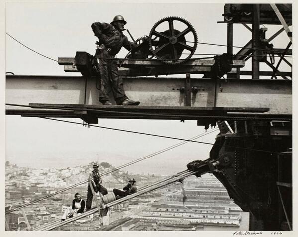 IStructE's tweet photo. San Francisco's Bay Bridge under construction http://t.co/a3zocUF0JJ (via @Gizmodo | Image Peter Stackpole) http://t.co/MPCnrSFSjO