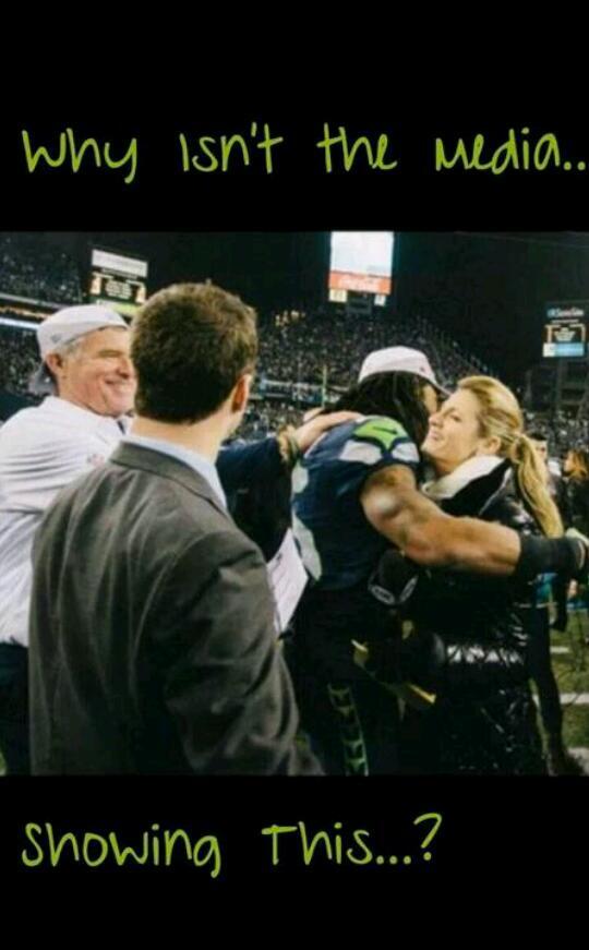 bleednsea84's tweet photo. Erin Andrews was so afraid of @RSherman_25 that her fear mysteriously compelled her to hug him afterwards. #America http://t.co/lAxWRULkh8