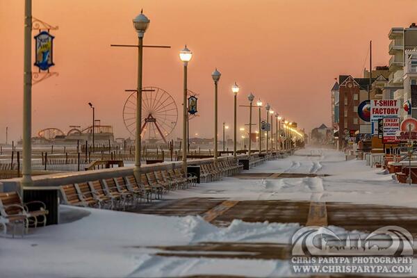 Snow on the boardwalk <a href="/OCMaryland/">Ocean City, Maryland</a> at sunrise. Drifts after 4" of powder fell. Thanks Chris Parypa Photography