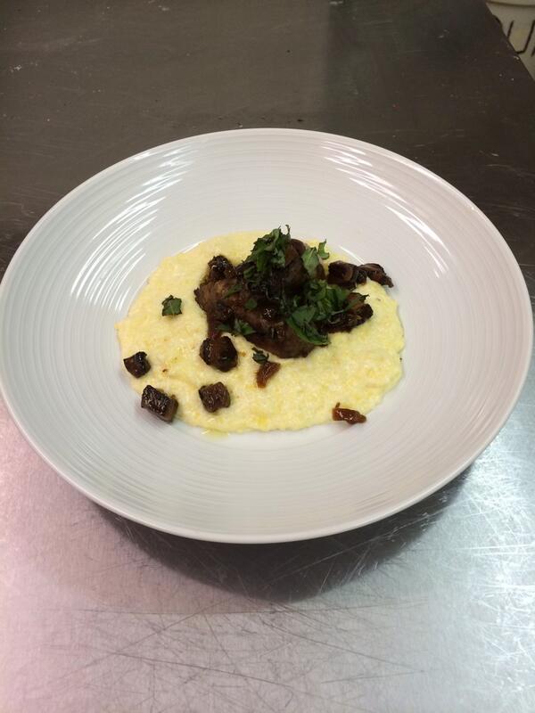 PantaleonesDen's tweet photo. Pastuccia! Our #1 appetizer, creamy polenta, housemade sausage and a pancetta raisin relish. http://t.co/Kl4uB6wmK6