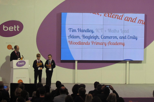 ukedchat's tweet photo. @tomhenzley & kids from Woodland Primary Academy take to the stage in #BETTArena Kid comments to #wpabett #bett2014 http://t.co/QJNFkDCfcf